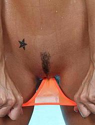 Laura Lee skimpy orange bikini