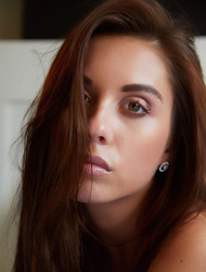 Sexy Sabrisse A lies on her bed looking so seductive in a black and blue teddy