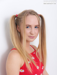 Pigtail girl stripping